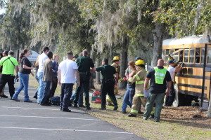 Deputies calm the "concerned parents" as rescue personnel triage patients 