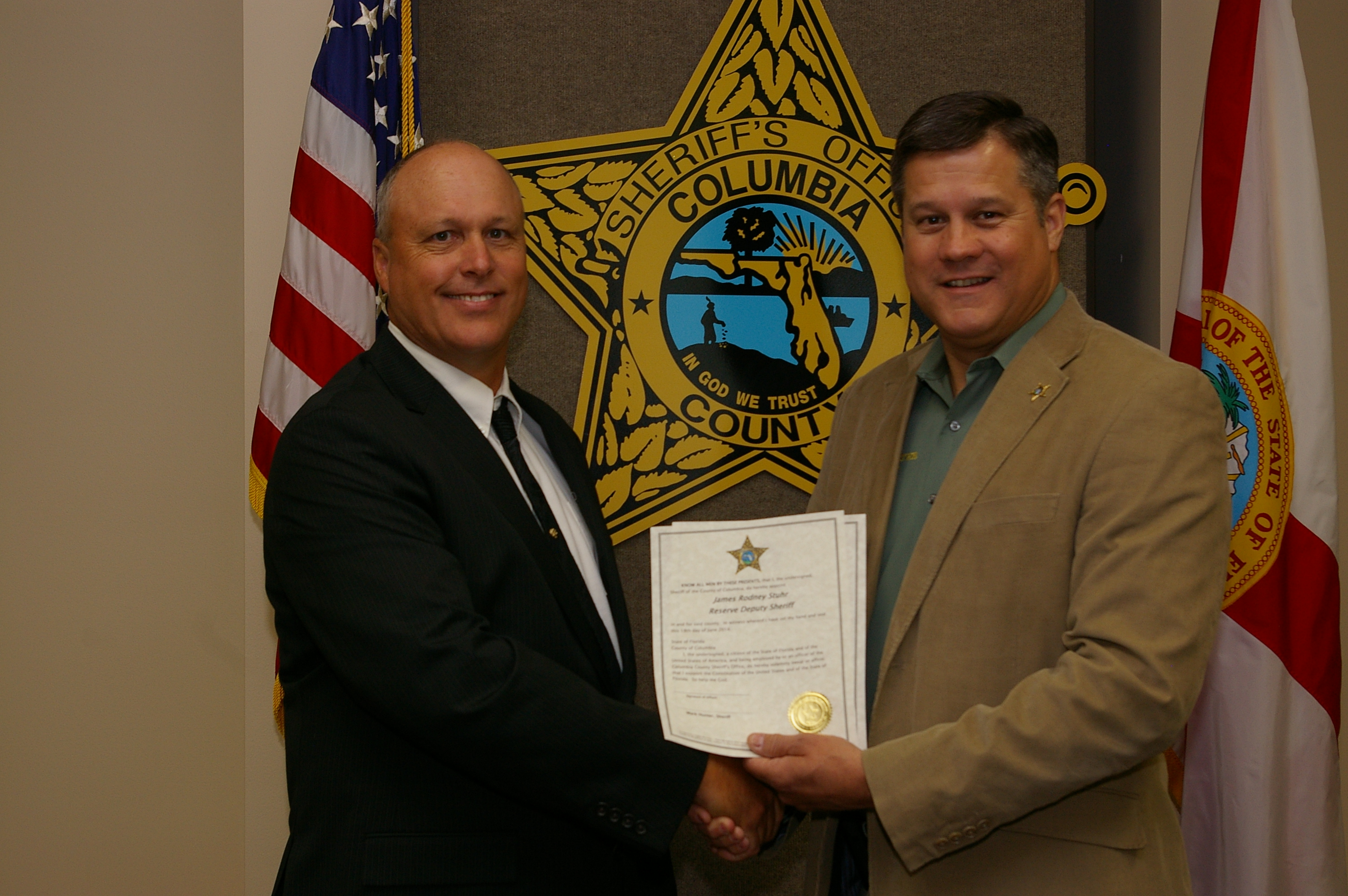 Deputy Sheriff James Stuhr and Sheriff Mark Hunter