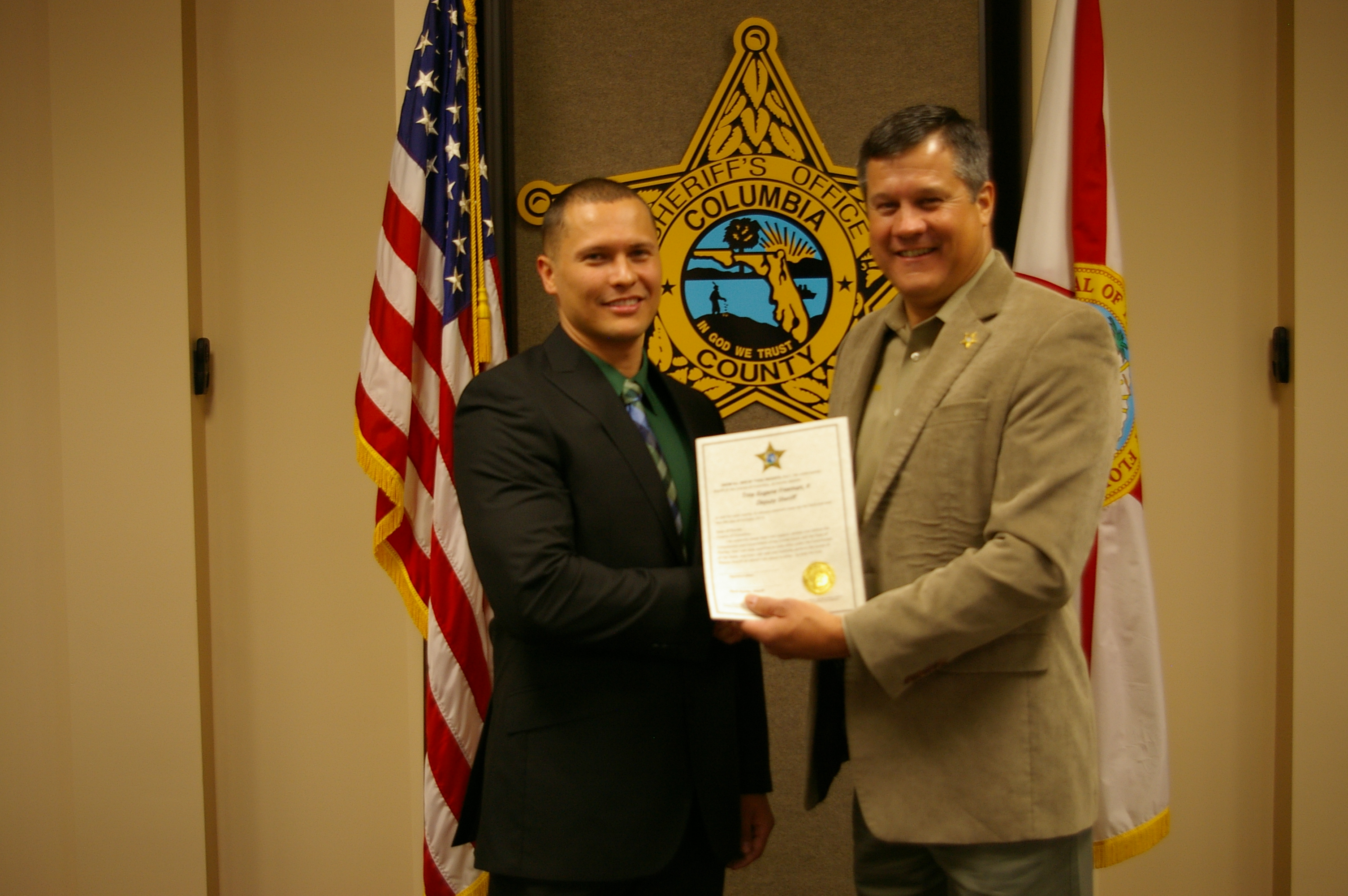 Deputy Sheriff Troy Freeman (L) and Sheriff Mark Hunter (R)