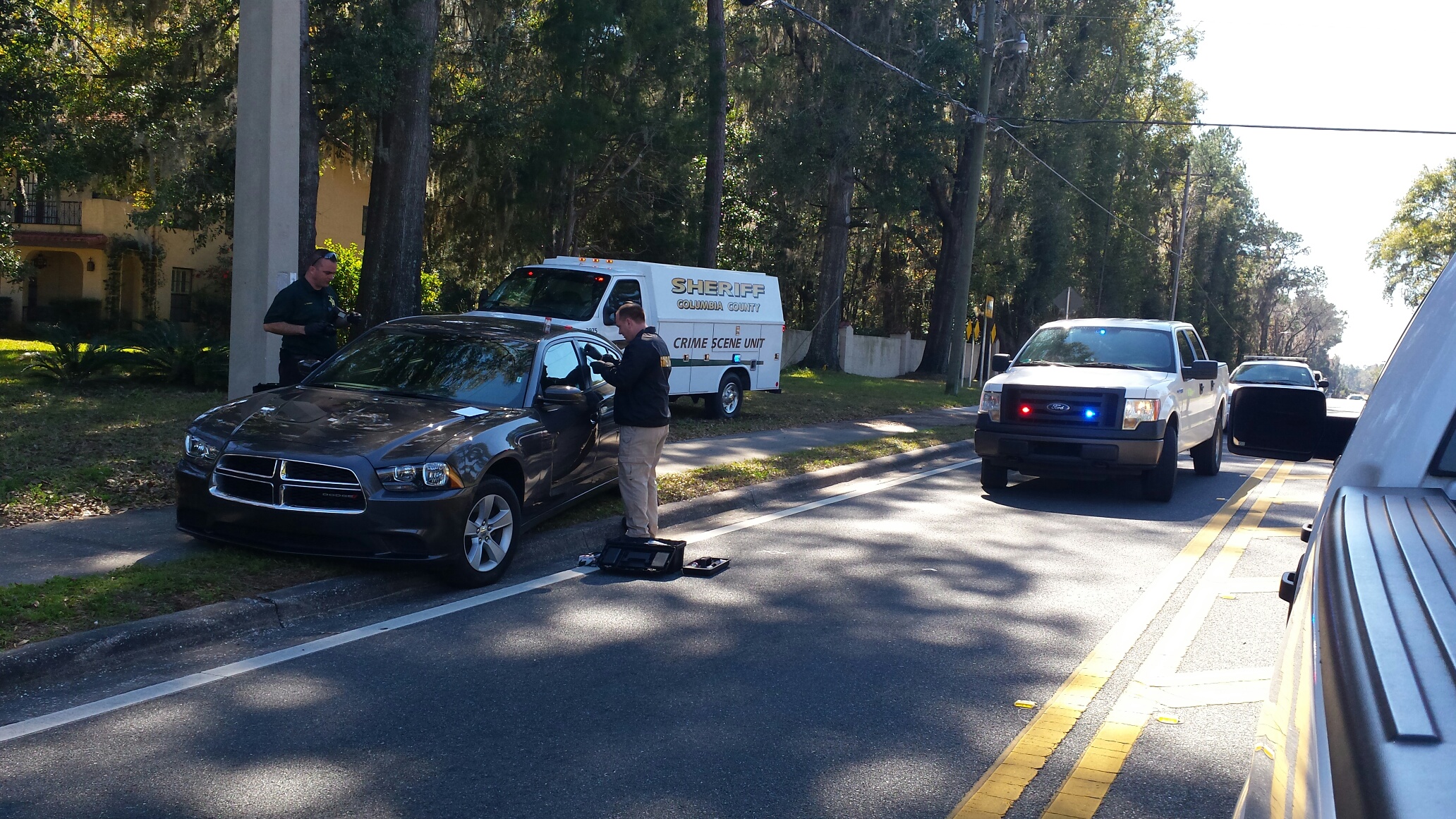 Sheriff's Crime Scene Unit processes the vehicle after the pursuit