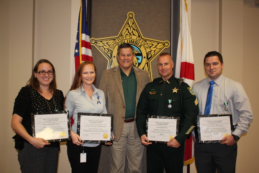 Sheriff Mark Hunter presented four agency members with awards due to their outstanding achievements.  Sergeant Howard Bulthuis, Detective Chris Parker, Detective Marcella Mayo and Analyst Yvette Tyler were given the awards for 2016 cases where they preformed their duties in a manner that brought great credit on them and the agency.