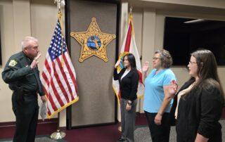 Sheriff Kitchings swearing-in Ashley Berry, Katrina Holton, and Tanya Wagner
